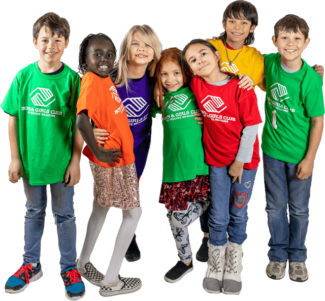 Seven smiling children embracing and wearing Boys & Girls Club of Truckee Meadows shirts