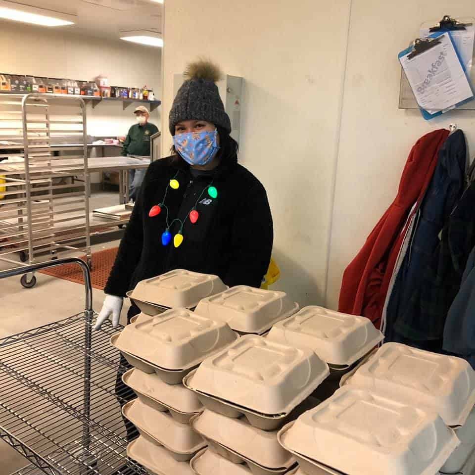 Meals are prepped for the children of essential workers' children in 2020 in response to the pandemic